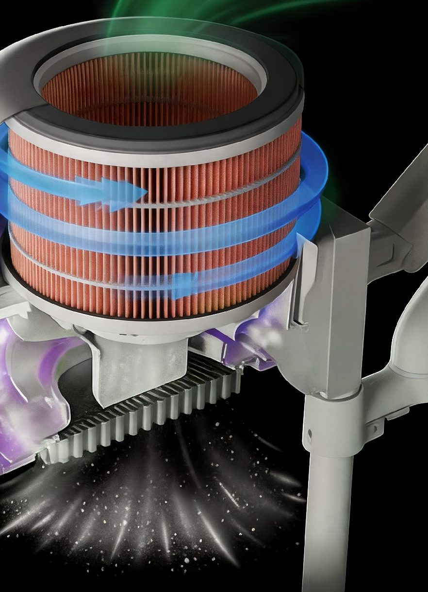 Vue en coupe d'un aspirateur à hotte sur bras articulé avec un filtre annulaire PureFibe, montrant l'air aspiré autour des plis