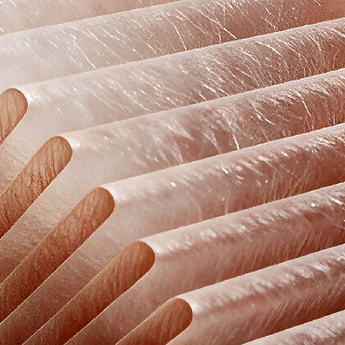 Close-up of the copper-colored pleated PureFibe media